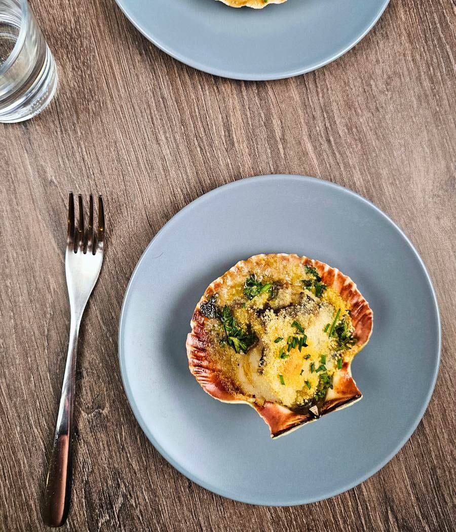 L'histoire des coquilles Saint Jacques à la Brestoise